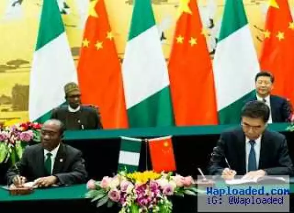 Buhari Signs Currency Deal With China To Crash The Dollar By 70%